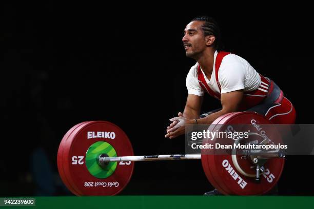 Marc Jonathan Coret of Mauritius competes during the Weightlifting Men's 62kg Final on day one of the Gold Coast 2018 Commonwealth Games at Carrara...