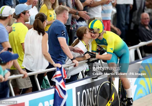 Australia's Alex Porter celebrates with his mother after the Men's 4000m Team Pursuit Finals Gold Medal Race at the Anna Meares Velodrome during day...