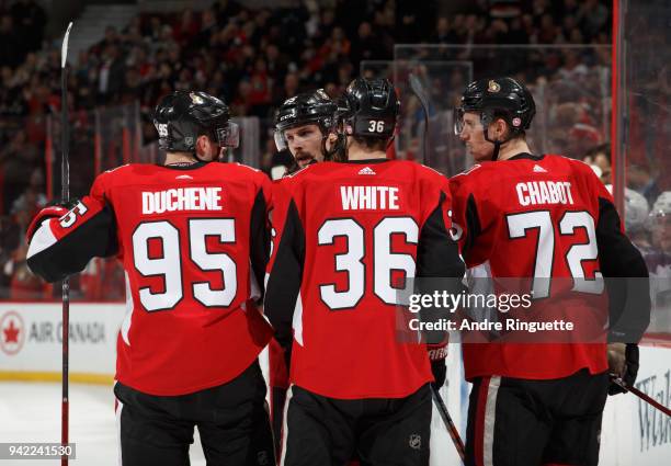 Thomas Chabot of the Ottawa Senators celebrates his third period goal against the Winnipeg Jets with teammates Matt Duchene, Erik Karlsson and Colin...