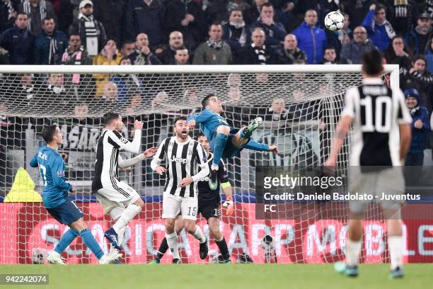 Cristiano Ronaldo of Real Madrid scores 0-2 goal during the UEFA Champions League Quarter Final Leg One match between Juventus and Real Madrid at...