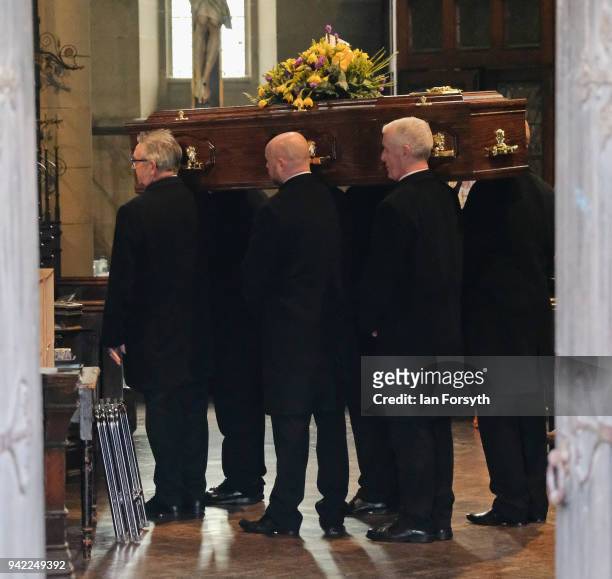 The coffin is carried into the funeral of Cardinal Keith Patrick O'Brien, formerly the Catholic Church's most senior figure in the country takes...