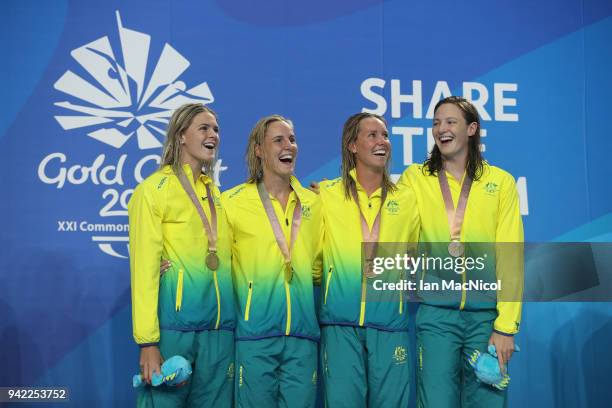 Gold medalists Shayna Jack, Bronte Campbell, Emma Mckeon and Cate Campbell of Australia pose during the medal ceremony for the Women's 4 x 100m...