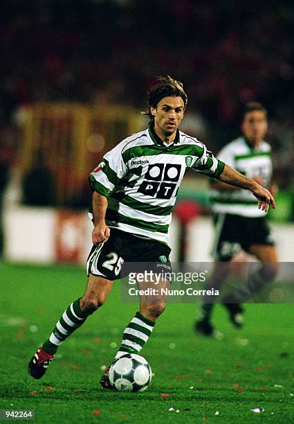 Joao Pinto of Sporting Lisbon runs with the ball during the Portuguese Campeonato match between Benfica and Sporting Lisbon played at the Stadium of...