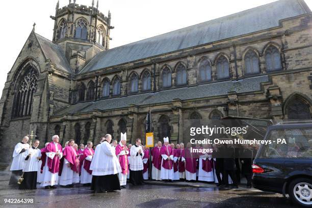The coffin of Cardinal Keith O'Brien leaves the Church of St Michael in Newcastle, after his funeral service.