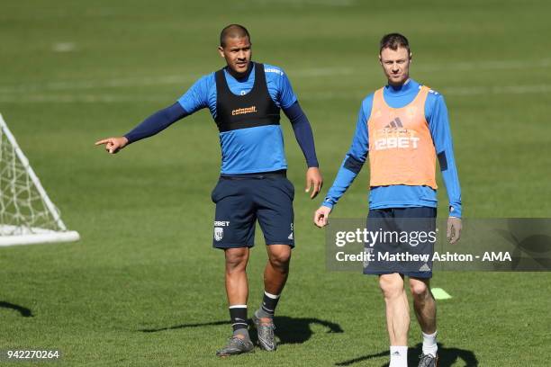 Salomon Rondon of West Bromwich Albion and Jonny Evans of West Bromwich Albion during a West Bromwich Albion training session on April 5, 2018 in...