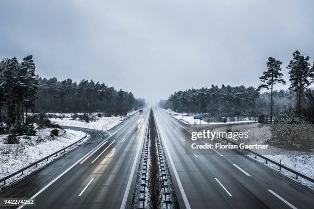 The highway A13 is pictured after snowfall on March 28, 2018 in Baruth, Germany.