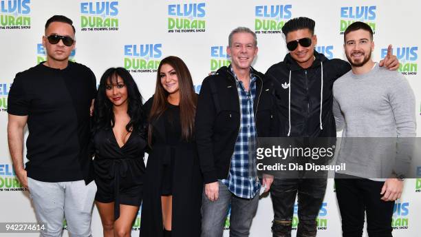 Elvis Duran poses with "Jersey Shore Family Vacation" cast members Mike "The Situation" Sorrentino, Nicole "Snooki" Polizzi, Deena Nicole Cortese,...