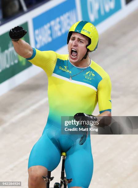 Sam Welsford of Australia celebrates winning gold in the Men's 4000m Team Pursuit Final during the Track Cycling on day one of the Gold Coast 2018...