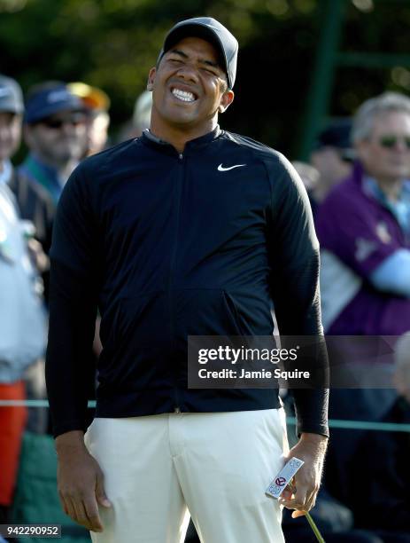 Jhonattan Vegas of Columbia reacts after putting on the first hole during the first round of the 2018 Masters Tournament at Augusta National Golf...