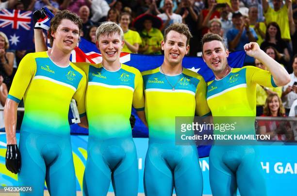 Australia's Pursuit Team Sam Welsford, Alex Porter, Jordan Kerby and Leigh Howard celebrate victory following the Men's cycling 4000m Team Pursuit...