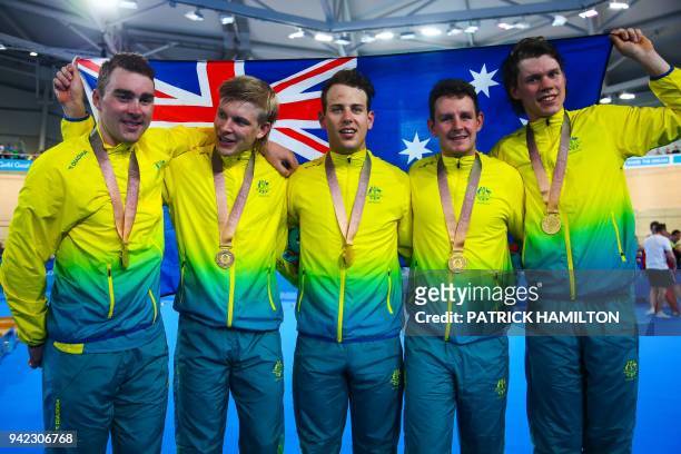 Australia's Pursuit Team Sam Welsford, Alex Porter, Jordan Kerby Kelland O'Brien and Leigh Howard celebrate victory following the Men's cycling 4000m...