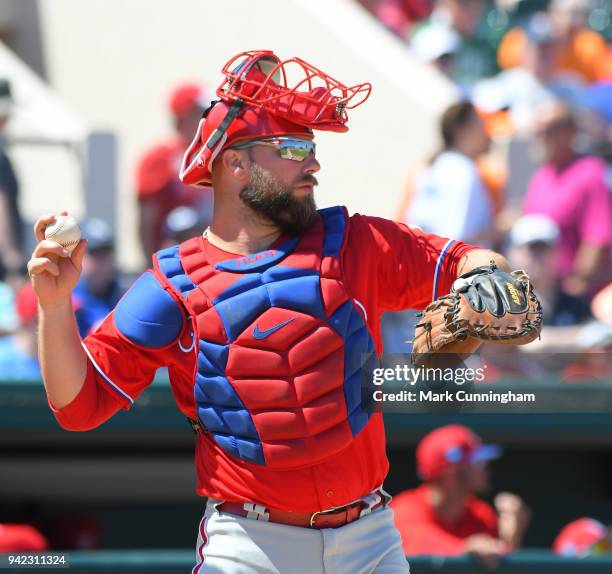 Cameron Rupp of the Philadelphia Phillies catches during the Spring Training game against the Detroit Tigers at Publix Field at Joker Marchant...