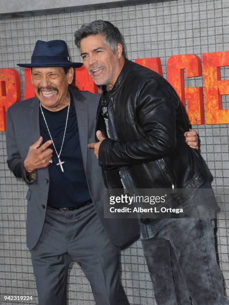 Actors Danny Trejo and Esai Morales arrive for the Premiere Of Warner Bros. Pictures' "Rampage" held at Microsoft Theater on April 4, 2018 in Los...