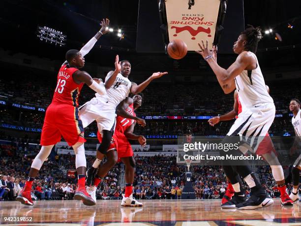 MarShon Brooks of the Memphis Grizzlies passes the ball to Dayonta Davis of the Mem[his Grizzlies during the game against the New Orleans Pelicans on...