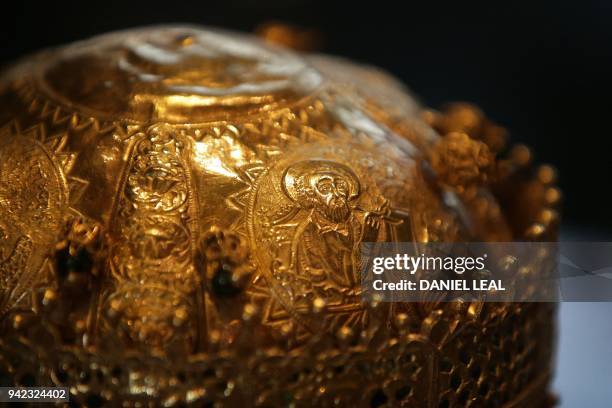 Detail of a Crown, made in Ethiopia around 1740, made of gold and gilded copper with glass beads, pigment and fabric is pictured at an exhibition,...