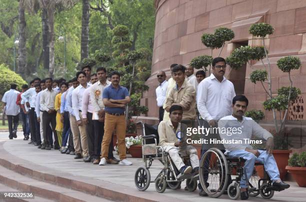 Disable people and other NGO members from Aligarh, Uttar Pradesh, arrive at Parliament to meet with Prime Minister Narendra Modi during the...
