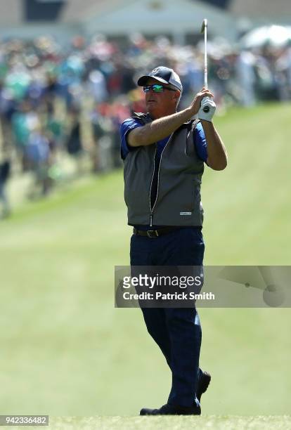 Sandy Lyle of Scotland plays his second shot on the first hole during the first round of the 2018 Masters Tournament at Augusta National Golf Club on...