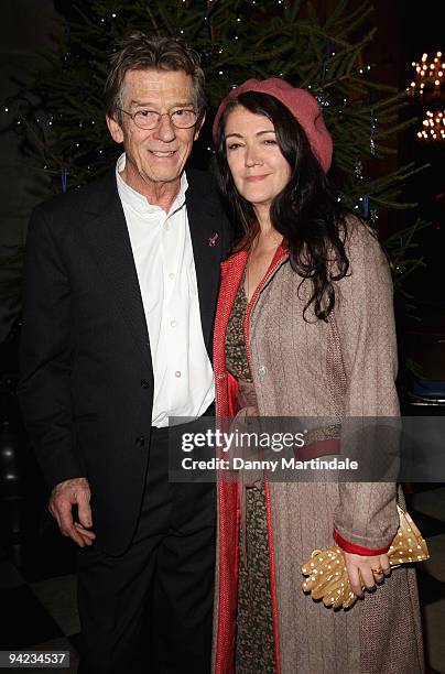 Actor John Hurt and producer Anwen Rees Meyers attend the Breast Cancer Care Christmas Carol concert at St Paul's Cathedral on December 9, 2009 in...