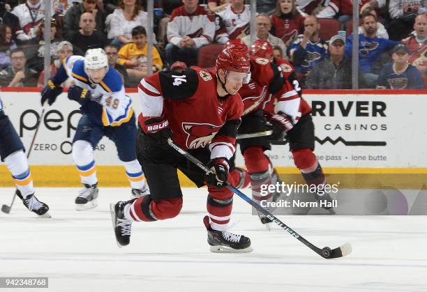 Richard Panik of the Arizona Coyotes skates the puck up ice against the St Louis Blues at Gila River Arena on March 31, 2018 in Glendale, Arizona.