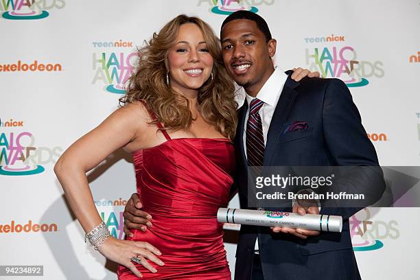 Nick Cannon, TeenNick Chairman, and his wife, Grammy Award-winning recording artist Mariah Carey, pose for photographers at a screening hosted by...