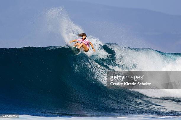 Rebecca Woods of Australia surfs to an equal fifth place finish at the Billabong Pro Maui on December 9, 2009 in Honolua Bay, Maui, Hawaii.
