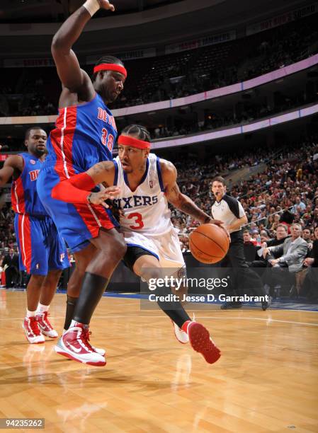 Allen Iverson of the Philadelphia 76ers drives against Kwame Brown of the Detroit Pistons during the game on December 9, 2009 at the Wachovia Center...