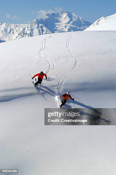 skiers in off-piste - alpine skiing stock pictures, royalty-free photos & images