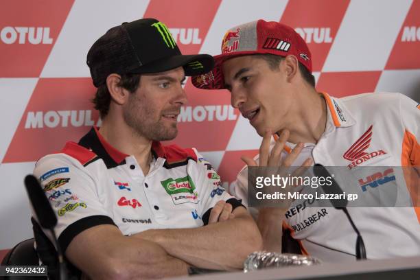 Cal Crutchlow of Great Britain and LCR Honda speaks with Marc Marquez of Spain and Repsol Honda Team during the press conference pre-event during the...