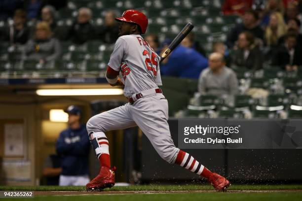 Dexter Fowler of the St. Louis Cardinals hits a home run in the first inning against the Milwaukee Brewers at Miller Park on April 3, 2018 in...