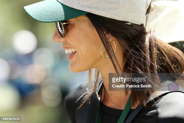 Allison Stokke walks the grounds during the first round of the 2018 Masters Tournament at Augusta National Golf Club on April 5, 2018 in Augusta,...