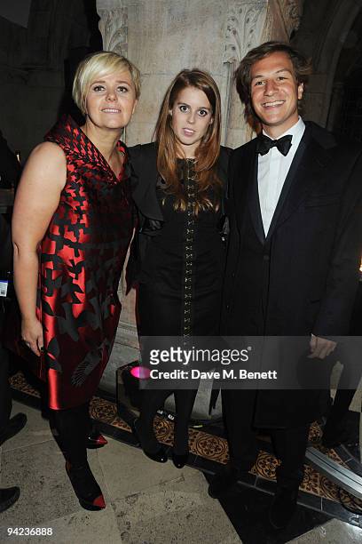 Guest, Princess Beatrice and Dave Clark attend the British Fashion Awards at the Royal Courts of Justice, Strand on December 9, 2009 in London,...