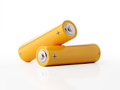 AA Size Two Yellow Batteries On White Background
