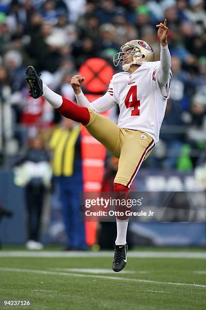 Punter Andy Lee of the San Francisco 49ers follows through on his kick during their NFL game against the Seattle Seahawks on December 6, 2009 at...