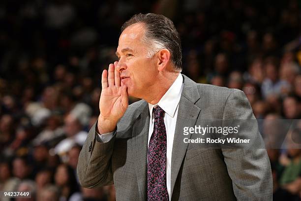 Head coach Jim O'Brien of the Indiana Pacers calls a play from the sideline during the game against the Golden State Warriors at Oracle Arena on...