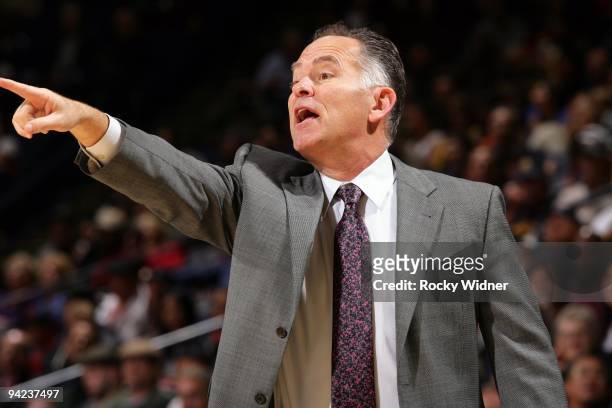Head coach Jim O'Brien of the Indiana Pacers points from the sideline during the game against the Golden State Warriors at Oracle Arena on November...