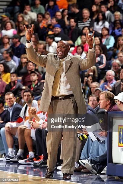 Assistant coach Keith Smart of the Golden State Warriors calls a play from the sidelines during the game against the Indiana Pacers at Oracle Arena...