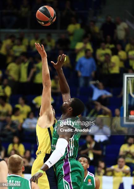 Ahmet Duverioglu of Fenerbahce Dogus in action against Viny Okouo of Unicaja Malaga during the Turkish Airlines Euroleague basketball match between...