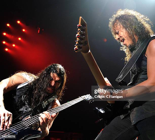 Bassist Robert Trujillo and Lead Guitarist Kirk Hammett of Metallica perform at ARCO Arena on December 8, 2009 in Sacramento, California.