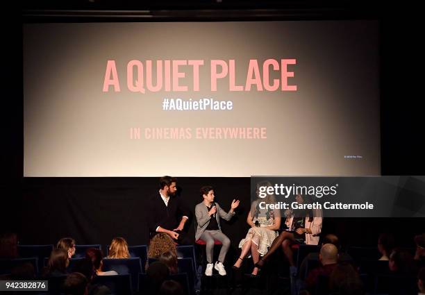 John Krasinski, Noah Jupe, Emily Blunt and host Rhianna Dhillon take part in the Q&A on stage at an immersive VIP Fan Screening of 'A Quiet Place' on...