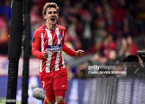Atletico Madrid's French forward Antoine Griezmann celebrates a goal during the UEFA Europa League quarter-final first leg football match between...