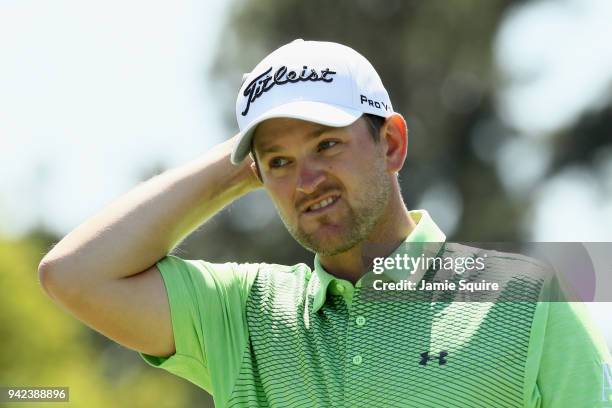 Bernd Wiesberger of Austria walks off on the 18th green during the first round of the 2018 Masters Tournament at Augusta National Golf Club on April...