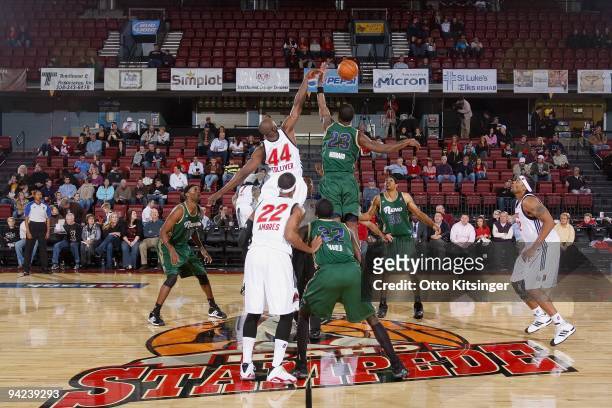 Anthony Tolliver of the Idaho Stampede goes after a jump ball against J.C. Mathis of the Reno Bighorns during the D-League game at Qwest Arena on...