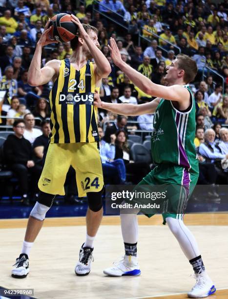 Jan Vesely of Fenerbahce Dogus in action against Adam Waczynski of Unicaja Malaga during the Turkish Airlines Euroleague basketball match between...