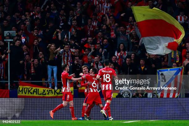 Antoine Griezmann of Atletico de Madrid celebrates scoring their second goal with teammates Saul Niguez , Koke and Diego Costa during the UEFA Europa...