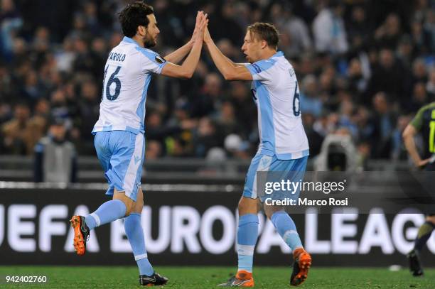 Marco Parolo of SS Lazio celebrates a second goal during the UEFA Europa League quarter final leg one match between Lazio Roma and RB Salzburg at...