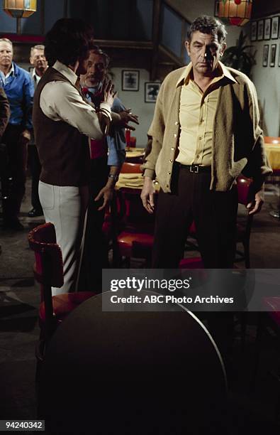The Squad guards a man whose life is thretened because he witnessed a murder during "Big George" which aired on April 7, 1972. MICHAEL COLE;ANDY...