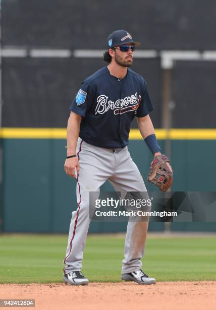 Dansby Swanson of the Atlanta Braves fields during the Spring Training game against the Detroit Tigers at Publix Field at Joker Marchant Stadium on...