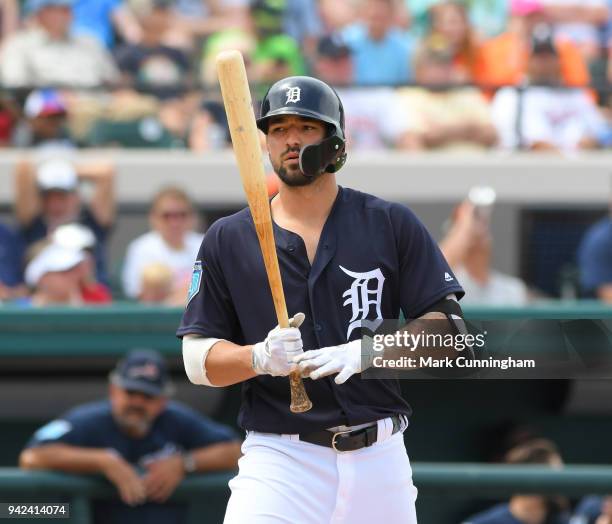 Nicholas Castellanos of the Detroit Tigers looks on while batting during the Spring Training game against the Atlanta Braves at Publix Field at Joker...