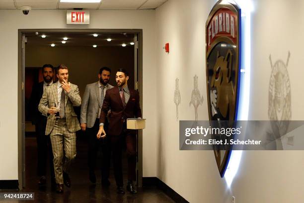 Jonathan Huberdeau of the Florida Panthers arrive with teammates Vincent Trocheck, Keith Yandle and Aaron Ekblad for tonights game against the Boston...