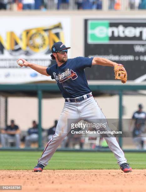 Charlie Culberson of the Atlanta Braves fields during the Spring Training game against the Detroit Tigers at Publix Field at Joker Marchant Stadium...